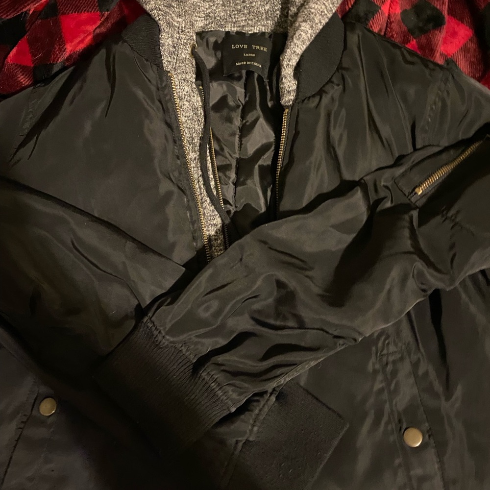 Black bomber jacket with hoodie and kangaroo pockets